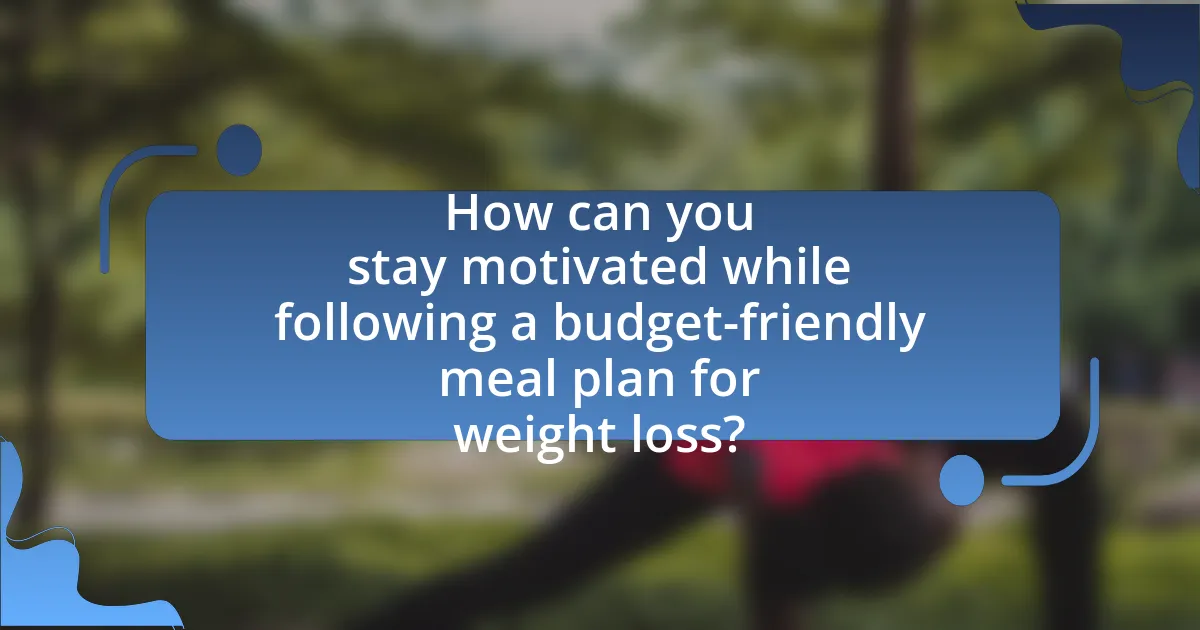 How can you stay motivated while following a budget-friendly meal plan for weight loss?